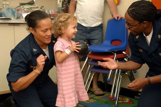 Doctors Practice P S Remesh 04 They still find time to play with patients. U.S. Navy Mass Communication Specialist 2nd Class Elizabeth Allen